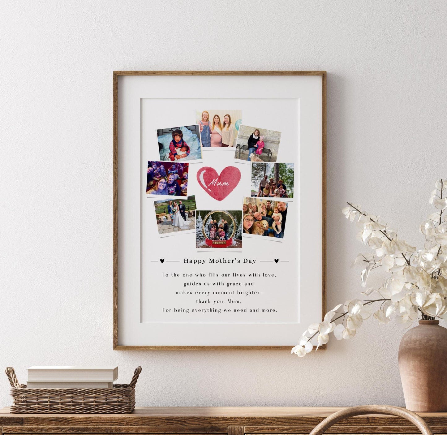 This is a framed Mother&#39;s Day collage featuring multiple family photos arranged around a central heart graphic that says &quot;Mum.&quot; The design includes a heartfelt message at the bottom that expresses love and gratitude for a mother’s guidance and presence. The frame can be black or white, and the background is white, giving it a clean and elegant look. The collage is placed against a light-colored wall on a wooden floor.