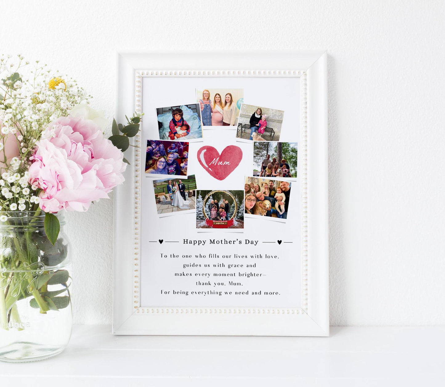 This is a framed Mother&#39;s Day collage featuring multiple family photos arranged around a central heart graphic that says &quot;Mum.&quot; The design includes a heartfelt message at the bottom that expresses love and gratitude for a mother’s guidance and presence. The frame can be black or white, and the background is white, giving it a clean and elegant look. The collage is placed against a light-colored wall on a wooden floor.