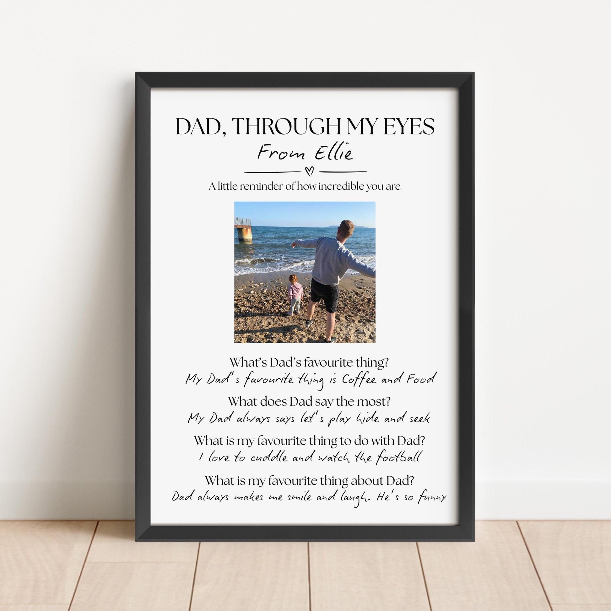 Personalized Father&#39;s Day print titled &#39;Dad in My Eyes&#39; featuring a child&#39;s name at the top, a central photo of the child and dad, and four heartfelt questions answered by the child: 1) What&#39;s Dad&#39;s favourite thing? 2) What does Dad say the most? 3) What is your favourite thing to do with Dad? 4) What is your favourite thing about Dad? A sentimental and custom keepsake gift celebrating the unique bond between father and child.