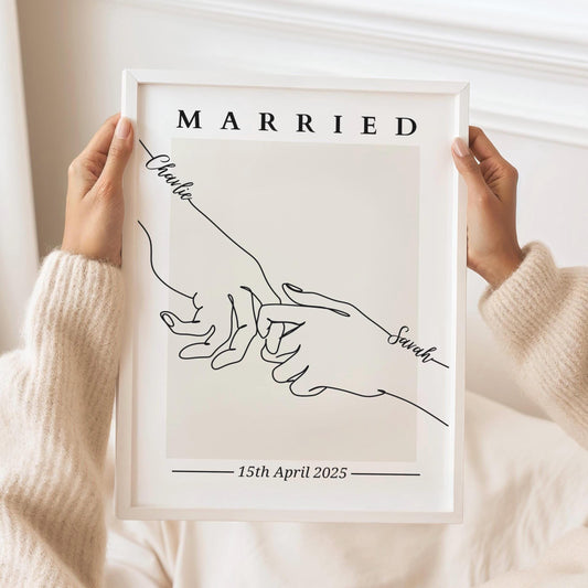 Minimalist line art illustration of a newlywed couple embracing, customized with names and wedding date.